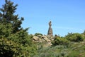 Statua San Michele on top of sardinian mountain landscape near Biddamanna IstrisÃ ili Villagrande Strisaili Arzana, Italy