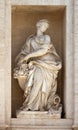 Statue of Abundance of Fruits. Detail of the Trevi fountain, Rome, Italy Royalty Free Stock Photo