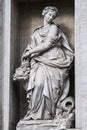 Statue of abundance in the Trevi Fountain. Rome