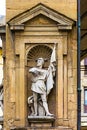 The statue adorns the building of the New Market in Florence Royalty Free Stock Photo