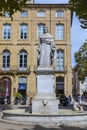 Statue in Aix-en-Provence of King Rene holding the Muscat grapes he brought to Provence