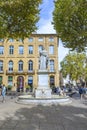 Statue in Aix-en-Provence of King Rene holding the Muscat grapes he brought to Provence