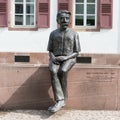 Statue of Albert Schweizer in a street in Strasbourg on a bright, sunny day