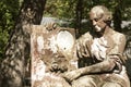 Statue of ancient angel on cemetery Royalty Free Stock Photo