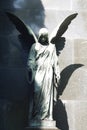 Statue of ancient angel on cemetery Royalty Free Stock Photo