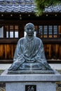 Statue of an ancient Japanese Buddhist monk and hero at Sengakuji Buddhist Temple in Tokyo Japan. Royalty Free Stock Photo