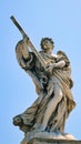 Statue of angel carrying cross on Pont Sant& x27;Angelo. Rome, Italy. Royalty Free Stock Photo