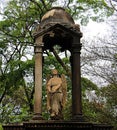 Statue of angel between columns.