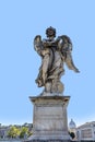 Statue of an Angel with the Cross by Ercole Ferrata on Sant`Angelo Bridge in Rome Royalty Free Stock Photo