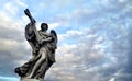 Statue of angel holding a cross Royalty Free Stock Photo