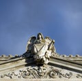 A statue of an angel placed above the temple. Royalty Free Stock Photo