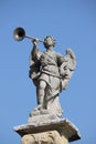 Statue of angel playing the horn Royalty Free Stock Photo