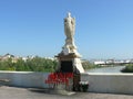 Statue of an angel in the Roman Bridge in Cordoba Royalty Free Stock Photo