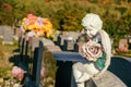 Statue of an angel on a tombstone Royalty Free Stock Photo