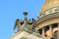 Statue of angels on the roof of Saint Isaac`s Cathedral in winter. Saint Petersburg. Russia