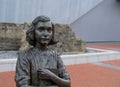 Statue of Anne Frank in front of the National World War II Museum in New Orleans, USA Royalty Free Stock Photo