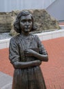 Statue of Anne Frank in front of the National World War II Museum in New Orleans, USA Royalty Free Stock Photo