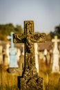 Statue of antique cross with the crucified Christ on the old 19th century cemetery. Ukraine Royalty Free Stock Photo