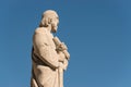 Statue of apostle observing on city Barcelona on Temple Sacred Heart of Jesus on Mount Tibidabo