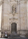 A statue of the Archangel Michael in the right niche of the front of the Church of Purgatory in Matera, Italy