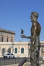 Statue of Archimedes on Ortygia Island in the square by Umberto I Bridge, Syracuse, Sicily, Italy