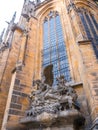 Statue around St. Vitus cathedral in Prague Castle front view of the main entrance in Prague, Czech Republic.Blue sky sunny backgr Royalty Free Stock Photo