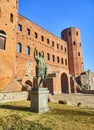 Statue of Augustus Caesar at Porta Palatina Gate. Piazza Cesare Augusto square. Turin, Piedmont, Italy