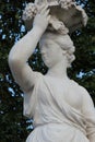 statue of a bacchante in the park of the castle of schonbrunn - vienna - austria