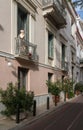 Statue on balcony of ancient residential district of Plaka in Athens Greece Royalty Free Stock Photo