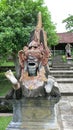 A statue of Barong embodying good and positive energy on Bali Island. Hindu Balinese mythology depiction in the royal garden.