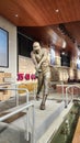 A statue of the baseball player Hank Aaron hitting a baseball inside of at Truist Park in Atlanta Georgia