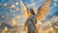 Statue of a beautiful angel with wings against a background of blue sky with magical golden light of the sun Royalty Free Stock Photo