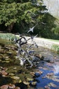 A statue of birds flying in the grounds of Le Manoir aux Quat Saisons in Oxfordshire in the UK Royalty Free Stock Photo