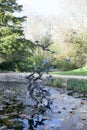 A statue of birds flying in the grounds of Le Manoir aux Quat Saisons in Oxfordshire in the UK Royalty Free Stock Photo