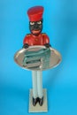 Statue of a black servant with a tacker on the tray Royalty Free Stock Photo