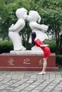 Statue of a boy and a girl who are kissing