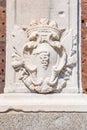 Statue on the brick wall of Sforza Castle Castello Sforzesco, built in the 15th century by Francesco Sforza, Duke of Milan, on Royalty Free Stock Photo