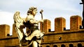 statue on the bridge of castel sant`angelo seen from below, made in 1669 by a pupil of Bernini