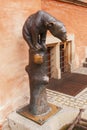 Statue of bronze bear with a long tongue at the Town Hall in Wroclaw. Poland