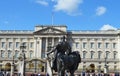 Statue with Buckingham Palace background