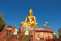 Statue Buddha on the banks of the Mekong River