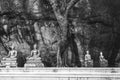 Statue of Buddha in the middle of temple in the mountain. Picture was shot in black and white. Royalty Free Stock Photo