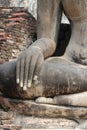 statue of buddha in a ruined buddhist temple (wat mahathat) in sukhothai (thailand)