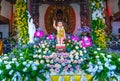 Statue Buddha`s birthday in Temple are ecorated lights, colorful flowers