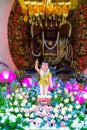 Statue Buddha`s birthday in Temple are ecorated lights, colorful flowers