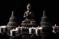 Statue of Buddha sitting in meditation, .with candles and .buddhist bells . Zen and meditation concept Royalty Free Stock Photo