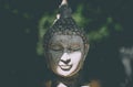 Statue of Buddha standing in meditation.Close up hand of statue Buddha.buddhism concept .peacefulness idea .lifestyle practise