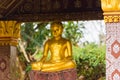 Statue of a buddhist god, Louangphabang, Laos. Copy space for text. Royalty Free Stock Photo