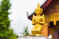 Statue of a buddhist godt, Louangphabang, Laos. Close-up. Royalty Free Stock Photo