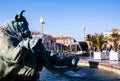 The statue of a bull with the tramway in the background Royalty Free Stock Photo